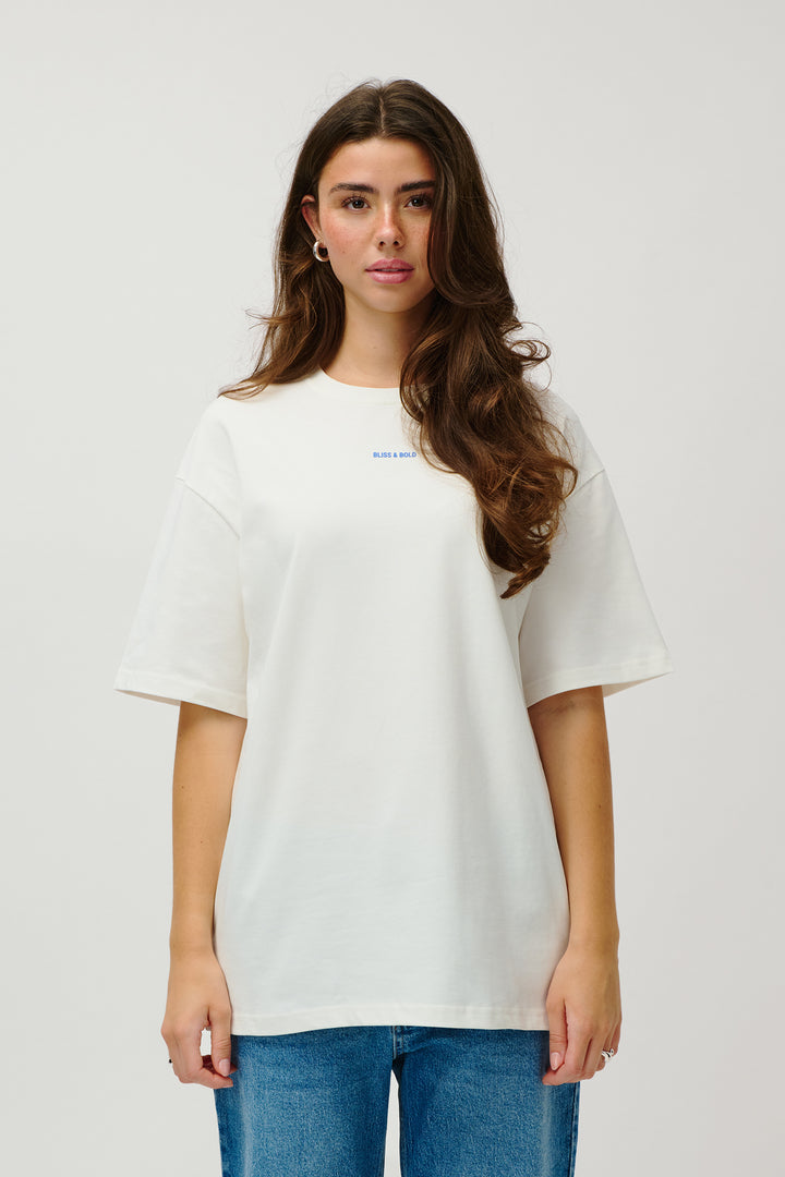 OVERSIZED TSHIRT OFF WHITE LOVE SURROUNDS ME