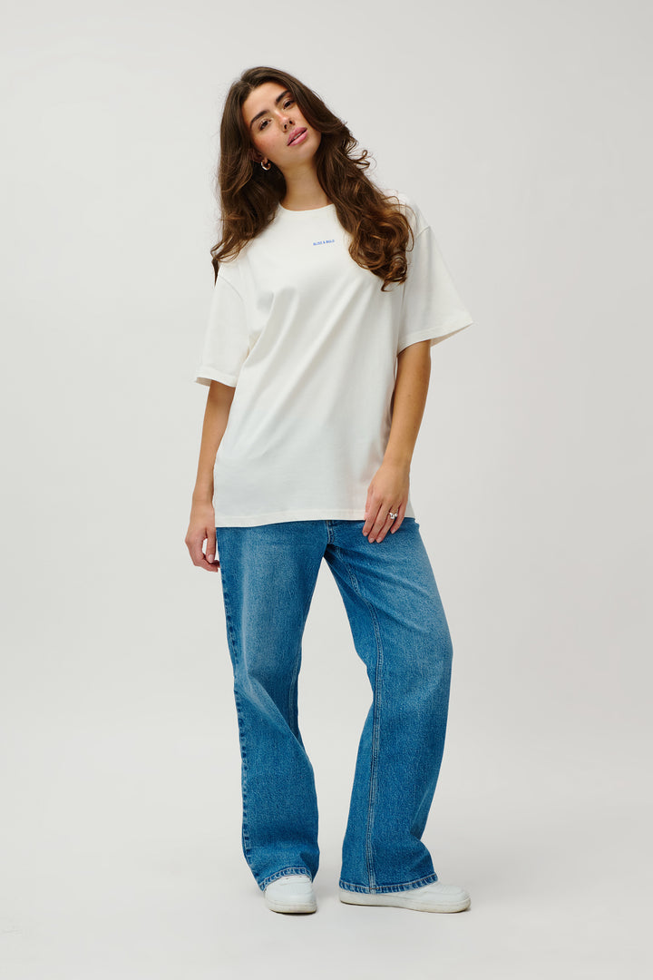 OVERSIZED TSHIRT OFF WHITE LOVE SURROUNDS ME
